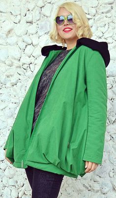 Green waterproof jacket made of taffeta and a knitted acrylic hoodie, perfect for spring. This wadded jacket is very comfortable and loose, being easy and fun to wear in rainy days or even sunny, yet chilly days of spring. We also have this design on black: https://www.etsy.com/listing/268552128/black-waterproof-jacket-casual-black Care instructions: Wash at 30 degrees The model in the picture is size S. Can be made in ALL SIZES. If you have any other specific requirements, do not hesitate to co Trendy Hooded Solid Color Parka, Trendy Solid Color Hooded Parka, Trendy Hooded Parka, Windproof Stretch Winter Outerwear, Trendy Winter Hoodie Windbreaker, Solid Windbreaker For Cold Weather In Spring, Solid Windbreaker For Cold Spring Weather, Fall Nylon Hooded Hoodie, Green Nylon Parka With Drawstring Hood