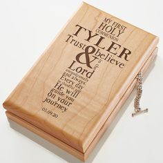 a wooden box with the words tyder and lord written in black ink on it