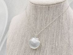 "A beautiful and lovely seashell locket necklace inside a velvet seashell gift box. It features a shining silver seashell and suspends in a silver finished brass chain along with lobster claw clasp closure. The shell locket inside can hold pictures in both side 16mm x 14mm. The necklace is available in seashell locket necklace only, or adding a stimulated cream white pearl charm along withe the seashell locekt necklace. The pearl is genuine Swarovski 6mm pearl. It is a wonderful idea for gift gi Seashell Locket, Melody Mermaid, Shell Locket, Silver Sea, Wedding Keepsakes, Pearl Charms, Shell Pendant, Beach Jewelry, Locket Necklace