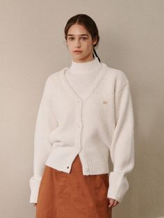 Composition : 8% wool, 21% nylon, 59% recycling poly 59% polyester, 11% spandex 1%Color : WHITE_ONECountry of Origin : KOREA White V-neck Outerwear For Layering, White Wool V-neck Outerwear, White Wool V-neck Sweater, Classic White V-neck Outerwear, White Wool Cardigan For Work, White Cardigan For Workwear In Fall, White Cardigan For Work In Fall, White V-neck Layering Outerwear, White Wool Winter Cardigan