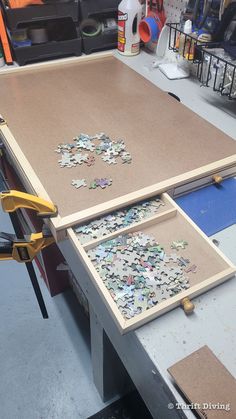 a workbench with several pieces of puzzle on it