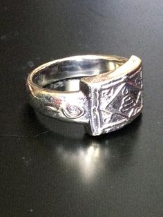 This is a perfect and unique style magic sacred ring made of silver metal by LP Kuay from Kositaram Temple. The power of the ring is to protect all dangers including ghost, evils and devils and the ring can bring good luck, fortune to the wearer. The ring showcases an elegant design with unique holy amulet. It is great to get this ring for your loved one or treat yourself for a classic timeless style. Amulet Name: LP Kuay Ring (1th Generation) Ring details: The ring engrave the Mantra of LP Kuay, Magic Letters Mantra Yantra blessed by LP Kuay Ring Size: 9 Stone Type: - Metal Type: Magic brass, Steel Weight: 19.22 Gram (Approx.) This is only one left For more information, please feel free to contact us. Thanks so much for your visit and support. Spiritual Etched Ring Jewelry, Collectible Spiritual Jewelry Ring, Spiritual Collectible Jewelry Rings, Adjustable Silver Jewelry For Rituals, Symbolic Ceremonial Ring, Ceremonial Symbolic Etched Jewelry, Symbolic Ceremonial Etched Jewelry, Symbolic Etched Jewelry For Ceremonial Occasions, Symbolic Adjustable Nickel-free Engraved Ring