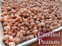 a bunch of food that is on top of a metal pan with the words candies peanuts