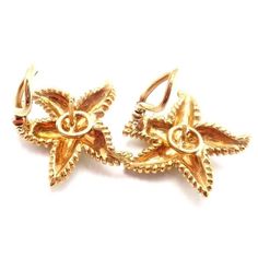 These Vintage Tiffany & Co. Starfish earrings are crafted in 18k yellow gold, featuring a large starfish design. These earrings are for pierced ears.  Details: Weight: 16.6 grams Measurements: 26mm x 26mm Stamped Hallmarks: T&Co 750 YOUR PRICE: $3,850 Item #: T3555mned Elegant Yellow Gold Starfish Charm Earrings, Yellow Gold Starfish Earrings For Gift, Gold Elegant Earrings With Starfish Charm, Elegant Yellow Gold Earrings With Starfish Charm, Elegant Gold Earrings With Starfish Charm, Yellow Gold Starfish Earrings With Starfish Charm, Luxury Yellow Gold Star Earrings, Starfish Design, Vintage Tiffany