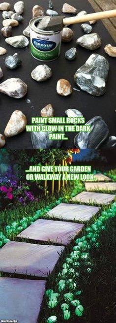 a garden with rocks and grass next to a walkway that has green paint on it