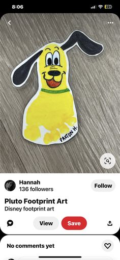 the sticker on the phone shows an image of a yellow dog with black ears