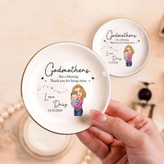 two personalized plates with the words grandmothers are being loved by their son and daughter