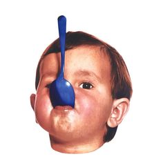 a child with a spoon in his mouth