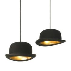 two black hats hanging from the ceiling