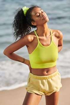 Happiness Runs Crop | Free People Sporty Stretch T-back Halter Top, Stretch Ribbed Racerback Sports Bra, Sporty Fitted Seamless Halter Top, Sporty Seamless Fitted Halter Top, Seamless Stretch Halter Top For Athleisure, Athleisure Seamless Halter Top For Sports, Seamless Athleisure Halter Top For Sports, Ribbed Racerback Sports Bra For Workout, Sporty Seamless Halter Top For Spring