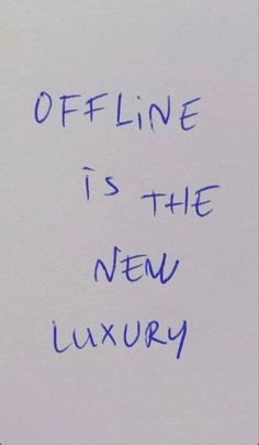 a piece of paper with writing on it that says offline is the new luxury