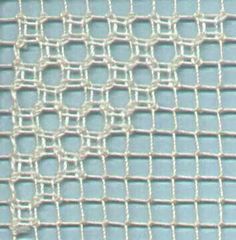 a close up view of a white net