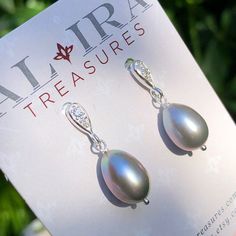 "6546 Grey Pearl Earrings Sterling Silver freshwater pearls small delicate dainty dangle drops cubic zirconia cz studs June birthstone birthday anniversary Valentine's day Mother's day Christmas holiday gift for her women mom sister wife girlfriend daughter niece aunt grandma cousin colleague best friend. Enjoy the beauty & power of natural gemstone. MATERIALS & DIMENSIONS ✦ Freshwater PEARL, grey, ovals approx. 11x9mm; ✦ STERLING SILVER pins and cubic zirconia (CZ) stud ear wires; ✦ The total l Classic Teardrop Earrings As Gift, Elegant Pear-shaped Teardrop Earrings As Gift, Elegant Teardrop Earrings With Pearl Charm For Gift, Teardrop Cubic Zirconia Pearl Earrings For Anniversary, Cubic Zirconia Teardrop Pearl Earrings For Anniversary, Teardrop Pearl Charm Earrings For Anniversary, Delicate Pearl Earrings With Cubic Zirconia For Gift, Dainty Silver Drop Pearl Earrings, Delicate Cubic Zirconia Pearl Earrings For Gift