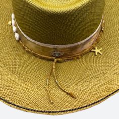 Silk and cotton ribbons with small details around crown Sweatband with 'Sun, Sea & Sand' inspirational quote All hats are unique and have perfect imperfections! Straw hat hand woven in Ecuador Hand made and designed by Valeria in California Gold Fedora With Curved Brim For Beach, Gold Curved Brim Fedora For Beach, Luxury Wide Brim Fedora For Beach, Luxury Wide Brim Fedora For The Beach, Gold Wide Brim Bohemian Fedora, Luxury Curved Brim Fedora For Beach, Luxury Beach Fedora With Curved Brim, Luxury Curved Brim Fedora For The Beach, Luxury Wide Brim Panama Hat For Beach