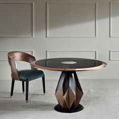 a round table with two chairs next to it in front of a paneled wall