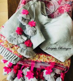 Pinterest • @bhavi91 Blouse Latkan Designs, Designer Lehenga Blouse, Latkan Designs, Blouse Hangings, Blouse Latkan, Tassels Fashion Clothing, Blouse Tassels, Designer Tassels, Tassels Designs