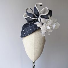 "READY TO SHIP TODAY ☀ Follow this link for more beautiful choices from 'Indigo Hats'  https://www.etsy.com/shop/IndigoHats ☀ ELOQUENCE Fascinator Handmade with care by Jaine You will look very stylish in this one and the feathers give it lovely movement. I hand blocked (steamed and stretched and pinned straw around a wooden shape)  a classic navy sinamay straw into this elegant teardrop percher shape.  I picked up the block on my last trip to England and I just love it.   After blocking I added Kentucky Derby Fitted Fascinator With Structured Crown, Chic Fitted Costume Hat With Structured Crown, Fitted Sinamay Headpiece For Kentucky Derby, Kentucky Derby Structured Crown Fascinator, Fitted Mini Hat With Structured Crown In Sinamay, Fitted Headpieces With Structured Crown For Royal Ascot, Chic Fitted Top Hat With Structured Crown, Fitted Headpiece For Royal Ascot With Structured Crown, Chic Fitted Fascinator With Pinched Crown