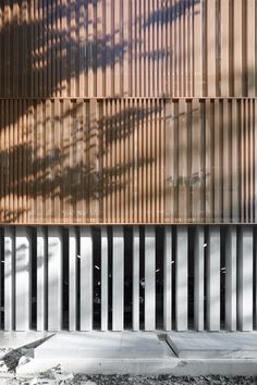 the side of a building with metal slats on it