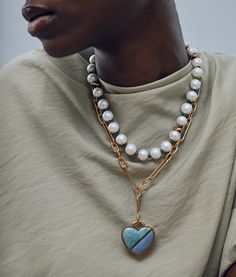 Let your jewelry do the talking with our Mood Necklaces and charms— a collection of bespoke baubles to mix, match, and layer. Love is always in style and our bold Heart Pendants are a modern classic. Ocean features a bisected amazonite and angelite heart set in gold-plated brass. Finish your perfect piece with one of Mood Necklace bases. Chunky Layered Necklace, Knotted Pearl Necklace, Stones Jewelry, Seed Pearl Necklace, Styling Pearl Necklace, Necklace Fashion, Popular Jewelry Trends 2024, Necklace Clasp, Necklace Pearl