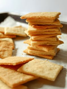 some crackers are sitting on a pan with ketchup in the bottom corner