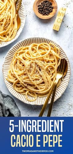 two plates filled with pasta on top of a white table next to a wooden spoon