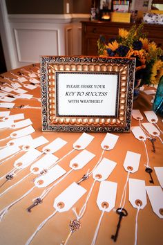 a table topped with lots of cards and a sign that says please share your attention with watermarks