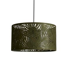 a green lamp hanging from the ceiling with palm leaves on it's drum shade