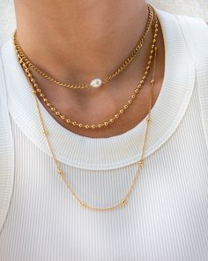 White Freshwater Pearl Choker on Gold Plated Stainless Steel Curb Chain Water Resistance Length of Necklace: approx. 13.5 inches (plus 2 inch extension chain) This necklace is made with a real freshwater pearl, therefore each pearl is unique and no two necklaces are alike. Two Necklaces, Ball Chain Necklace, Necklace Chain Lengths, White Freshwater Pearl, Pearl Choker, Curb Chain, Ball Chain, Necklace Length, Chain Lengths