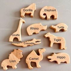 wooden animal magnets with names on them