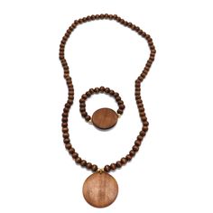 PRICES MAY VARY. Tribal Wood Beaded Necklace Set -- The perfect handmade wooden necklace and bracelet in one package. It is very light and will not be any burden at all. Pure natural wood, feel the breath from nature. Strong resort style, have fun and create your own unique style. Material -- Natural Wooden beads, hypoallergenic. From design to material selection to production, we strive for excellence. Our designs are not only decorative, but also finely crafted. Simple Style -- Size to size, w Beaded Natural Wood Jewelry, Natural Wood Beaded Jewelry, Natural Wooden Bohemian Jewelry, Natural Wood Bohemian Jewelry, Wooden Large Beads Jewelry As Gift, Bohemian Jewelry With Natural Wood Round Beads, Natural Wood Jewelry With Round Wooden Beads, Bohemian Beaded Natural Wood Jewelry, Bohemian Wood Bead Jewelry