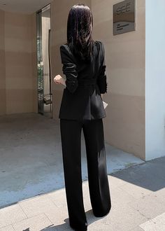 Elevate your wardrobe with our Megan Double Breasted Blazer Wide Pants Suit. This two-piece set features a sophisticated and exclusive design with a double-breasted blazer and wide-leg pants. Perfect for any occasion, this black suit exudes elegance and taste. Blazer: Double Breasted closure Notched lapels Long sleeves Front flap pockets Pants Zip fly with button closure Side slant pockets Regular length - Polyester, spandex- Item #43199- Women's blazer & pants suit two-piece set SIZE INFO XS=US Elegant Black Suit With Double-breasted Button Fastening, Fitted Black Double-breasted Suit With Double Button Closure, Luxury Black Single-breasted Pantsuit, Elegant Double-breasted Black Blazer, Luxury Black Double-breasted Blazer, Pockets Pants, Pants Suit, Black Suit, Breasted Blazer