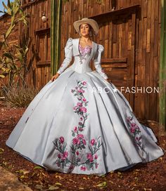 Be selfie ready in this three-piece floral charro off the shoulder ball gown with A-line skirt by Ragazza Fashion M50-150. This beautiful long off the shoulder dress features a sweetheart corset bodice, open lace-up back, and a floor length A-line skirt with a sweep train. The bolero jacket is included – giving you a versatile second look throughout your party! The cowboy hat shown in the catalog pictures is not included. 3-Piece Charro Quinceanera Dress by Ragazza M50-150 Designer: Morena y Esencial Pioneer Collection by Ragazza Fashion 2024 Style Number: M50-150 Colors: Silver/Fuchsia Pink Sizes: 3, 5, 7, 9, 11, 13, 15 Since this is a three-piece dress, the top skirt and bodice are removable. We love this because it gives you multiple looks throughout your party. The cowboy hat shown in Mariachi Quinceanera Dress, 15 Quinceanera Dresses, 1500 Dresses, 15 Quinceanera, Charro Quinceanera Dresses, Quinceañera Dresses, Sweetheart Corset, Embroidered Corset, 15 Dresses Quinceanera