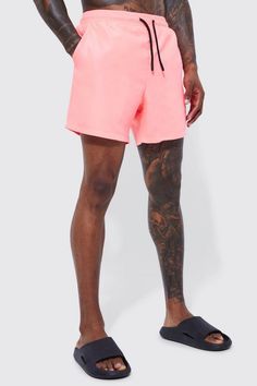 If it's comfort that you're looking for in men's holiday fashion, pick a pair of shorts from our unrivalled selection. You haven't been skipping leg day, have you? No, we know you wouldn't. All the better as you'll want to sport some of our stylish denim shorts, chino shorts, jersey shorts or cargo shorts. If you're looking for new outfit ideas for this summer, consider pairing a horizontal striped t-shirt with jean shorts or opt for a printed shirt and chino shorts for a smarter combo. Round off with a pair of sliders or loafers for extra style points. A Bigger Splash, Gym Jacket, Plus Size Joggers, Going Out Trousers, Going Out Shirts, Pink Swim, Party Mode, Gym Hoodie, Men's Swimwear