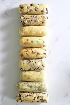 a stack of doughnuts sitting on top of a white counter