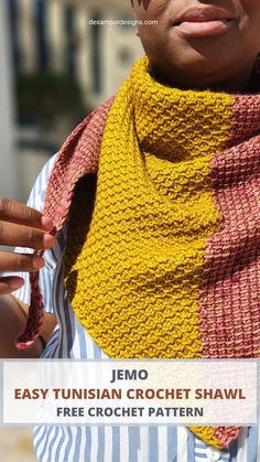 a woman wearing a yellow and red knitted shawl with text overlay that reads, jemo easy tunisan crochet shawl free crochet pattern