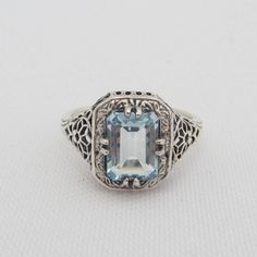 Vintage Sterling Silver Aquamarine Filigree Ring ...Marked 925...Total of weights 2.3grams...Size 9...Measure of Face 12mm...It's in good condition Classic Sterling Silver Signet Ring With Accent Stones, Elegant Blue Topaz Signet Ring With Gemstone, Elegant Blue Topaz Gemstone Signet Ring, Classic Sterling Silver Birthstone Ring With Gemstone, Classic Silver Gemstones With Center Stone, Classic Blue Topaz Gemstone Ring, Classic Sterling Silver Gemstone Ring, Classic Sterling Silver Gemstones For Anniversary, Sterling Silver Engraved Gemstone Ring