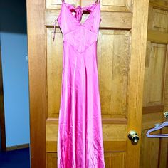 This Is A Size Medium Or Size 6 Evening Dress. No Alterations Have Been Done To It. It Was Never Worn. Smoke & Pet Free Home Pink V-neck Summer Gown, Summer Pink V-neck Gown, Summer Maxi Gown With Tie Back, Summer Tie Back Maxi Gown, Spring Date Night Maxi Gown, Pink Silk Dress With Tie Back, Floor-length Tie Back Slip Dress For Spring, Floor-length Slip Dress With Tie Back For Spring, Sleeveless Tie Back Summer Gown