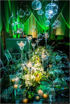 a table with candles and flowers on it