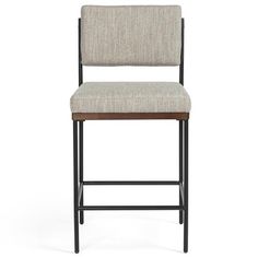 an upholstered bar stool with a wooden seat and backrest in grey fabric