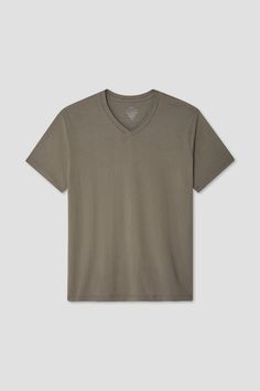 Everything a t-shirt should be: simple, modern, and classic. Spun from America's best cotton and garment-dyed for a soft, worn-in feel. Basic v-neck. -100% Supima cotton, grown in America-Garment-dyed, pre-shrunk-V-neck David is 6'2" and wearing size M. White Tee Men, V Neck Shirt, Fashion Suits For Men, Fashion Suits, Tee Shirt Dress, Lounge Shorts, Supima Cotton, Sweater Pants, White Tee