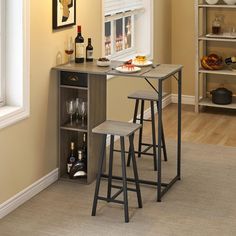 three stools and a table in a room with shelves, wine bottles and glasses