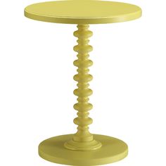 a yellow side table with spiral legs and a round top on an isolated white background