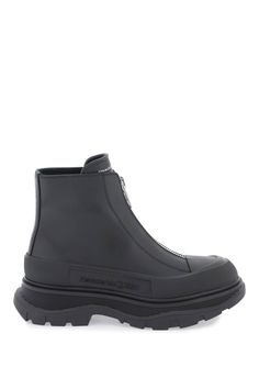 Leather Zip Tread Slick ankle boots by Alexander McQueen with front zippered closure, silver lettering logo on togue and heel, leather interior and rubber sole with side embossed lettering logo. Mcqueen Icon, Mcqueen Boots, Lettering Logo, Black Leather Ankle Boots, Leather Cap, Beach Tote Bags, Boots For Sale, Embossed Logo, Shoe Game