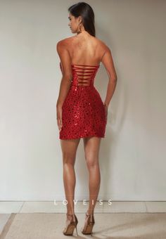 Get ready to stand out in this daring red homecoming dress! With a sheath silhouette and sweetheart neckline, this tight and short dress is designed to make a statement. Perfect for graduation or any special event, this dress will have you feeling fearless and ready to take on the night. Corset Back Mini Dress For Prom Season, Sweetheart Neckline Mini Dress With Corset Back For Homecoming, Homecoming Mini Dress With Corset Back And Fitted Bodice, Fitted Mini Dress With Corset Back For Homecoming, Red Strapless Glamorous Corset Dress, Glamorous Red Strapless Corset Dress, Flirty Homecoming Corset Dress With Corset Back, Flirty Corset Dress For Homecoming And Prom Season, Flirty Homecoming Dress With Corset Back