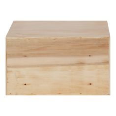 a wooden box sitting on top of a white surface