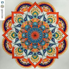 an artistic drawing with colored pencils and watercolor paints on paper, in the shape of a flower ornament