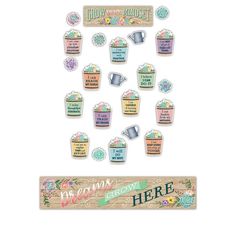 a bunch of stickers that are on top of a wooden sign with words and flowers