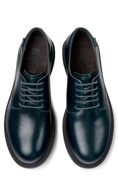 A burnished leather upper and precise stitching give this classic lace-up shoe a polished finish. Lace-up style Leather upper/recycled-polyester, recycled-cotton and textile lining/synthetic sole Imported Fall Derby Low-top Lace-up Shoes, Leather Oxfords With Laces For Work, Leather Dress Shoes With Laces For Work, Business Low-top Lace-up Shoes For Fall, Business Fall Low-top Lace-up Shoes, Business Lace-up Low-top Shoes For Fall, Workwear Leather Shoes With Plain Toe And Laces, Plain Toe Leather Shoes For Work, Modern Leather Lace-up Shoes For Derby