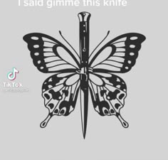 a black and white butterfly holding a knife