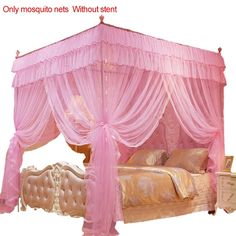 a pink canopy bed sitting next to a white dresser